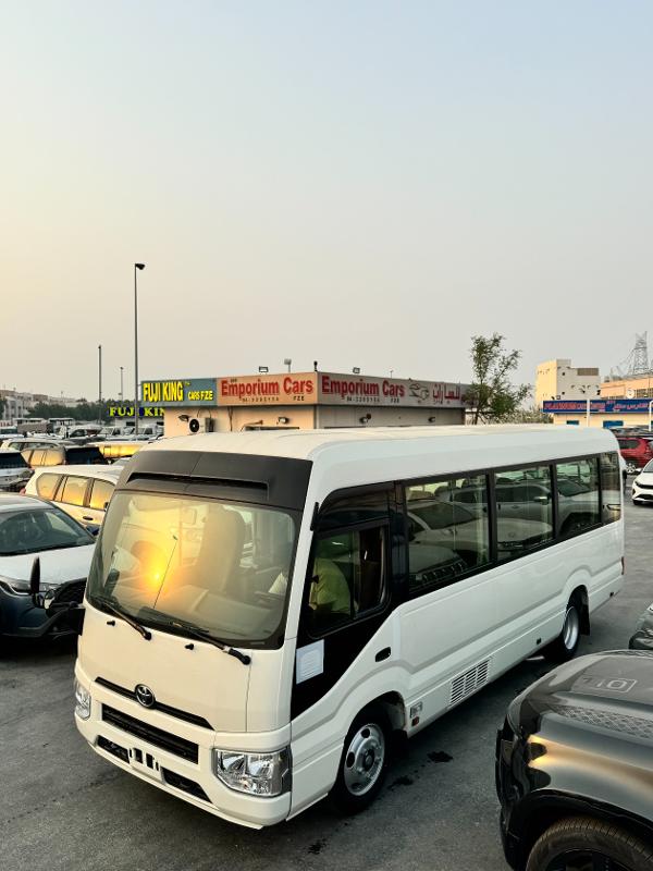 Rent Bus Egypt offers the Toyota Coaster 24-seater bus rental service