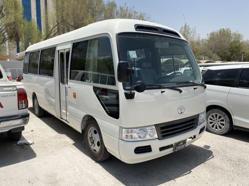 "Travel in Style with Toyota Coaster Minibus – Airport Transfers & Sightseeing Tours"